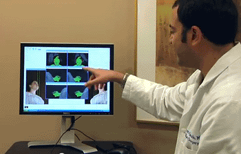 Image: Darren Smith, MD, resident, UPMC Division of Plastic and Reconstructive Surgery, talks about a new fused 3-D model that can be manipulated by surgeons to prepare for complex face transplant surgeries. The technology is currently being developed by UPMC's Reconstructive Transplantation Program (Photo courtesy of the University of Pittsburgh Medical Center).